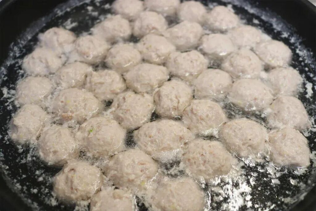 What do cooked pork meatballs look like?